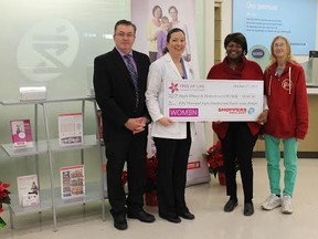 Shoppers Drug Mart raised more than $50,000 for Single Women in Motherhood, through the Tree of Life campaign. From left Dominic Gniewek, of Shoppers, Norma Gniewek of Shoppers, who organized the Tree of Life campaign locally, SWIM executive director and founder Ann-Marie Ricketts and SWIM client Mary Pritchard.