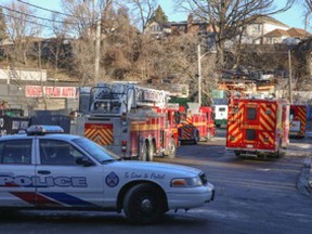 The scrapyard blaze on Hyde Ave. reached four-alarm status Friday morning. (DAVE THOMAS/Toronto Sun)