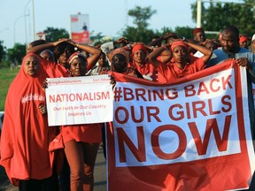 "#Bring Back Our Girls" campaigners participate in a lamentation parade, as more towns in Nigeria come under attack from Boko Haram in Abuja, November 3, 2014. Violence in Nigeria's northeast has been on the rise since the government announced a ceasefire with the rebels nearly two weeks ago to pursue talks in neighboring Chad aimed at freeing more than 200 girls kidnapped in April. Boko Haram's leader said the girls had been "married off" to his fighters, contradicting an earlier announcement of a deal to release them.    REUTERS/Afolabi Sotunde