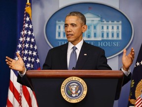 U.S. President Barack Obama responds to a question after his end of the year press conference in the briefing room of the White House in Washington, December 19, 2014. REUTERS/Larry Downing