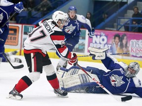 Ottawa 67's Travis Konecny shoots to score on  Sudbury Wolves goalie Troy Timpano, during first period OHL action from the Sudbury Community Arena on Friday January 2/2015.Gino Donato/The Sudbury Star/QMI Agency