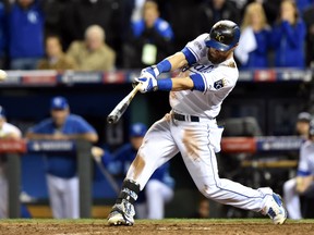 Kansas City Royals outfielder Alex Gordon hits a single against the San Francisco Giants in Game 7 of the World Series at Kauffman Stadium, Oct. 29, 2014. (USA Today)