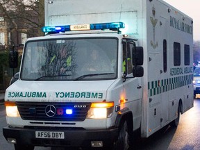 A convoy carrying a female Ebola patient arrives at the Royal Free Hospital in London December 30, 2014. REUTERS/Neil Hall