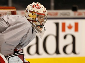 Canadian goalie Zach Fucale readies himself in net for shooting drills. (Jack Boland/Toronto Sun/QMI Agency)