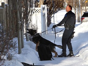 Police SWAT team on scene on 107 st and 84 ave in Edmonton, Alta., on Saturday Jan.3, 2015. The police were arresting a man on a Canada wide warrant.  Perry Mah/Edmonton Sun/QMI Agency