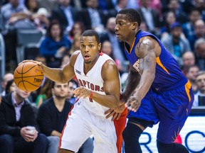 Kyle Lowry of the Toronto Raptors is chased by Eric Bledsoe of the Phoenix Suns during an NBA game at the Air Canada Centre in Toronto on Nov. 24, 2014. (ERNEST DOROSZUK/Toronto Sun files)