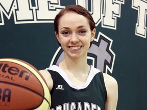 Mackenzie Curran, 17, has been named a 2014-15 OFSSA Character Athlete award winner. The Holy Cross Crusader recently battled cancer but was able hit the court this season.  (Steph Crosier/The Whig-Standard)