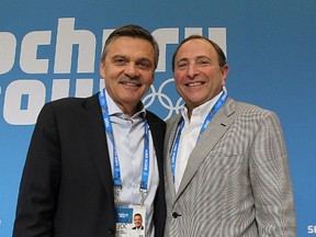 IIHF president Rene Fasel and NHL commissioner Gary Bettman pose for a photo during a press conference at the 2014 Olympic Winter Games in Sochi, Russia, on Tuesday February 18, 2014. (Al Charest/Calgary Sun/QMI Agency)