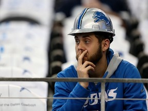A Detroit Lions fan looks on before a NFC Wild Card Playoff game against the Dallas Cowboys at AT&T Stadium on January 4, 2015 in Arlington, Texas. (Sarah Glenn/Getty Images/AFP)