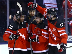 Team Canada celebrates a goal against Team Slovakia during the semifinals at the 2015 World Junior Hockey Championships at the Air Canada Centre in Toronto on Sunday January 4, 2015. (Dave Abel/Toronto Sun/QMI Agency)