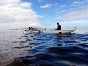 During an excursion off Maui, participants snorkel right from the outrigger canoe. STEVE MacNAULL PHOTO