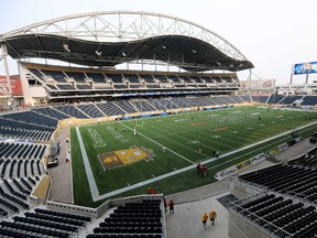 Despite the Bombers making a loan payment over the holidays, the bill for Investors Group Field continues to climb. (Trevor Hagan/Getty Images/AFP file photo)