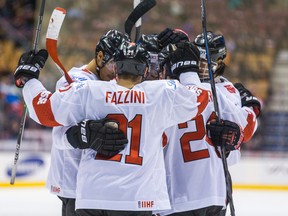 Switzerland celebrates a goal against Germany during the 2015 World Junior Championship at the Air Canada Centre on January 3, 2015. (Ernest Doroszuk/Toronto Sun/QMI Agency)