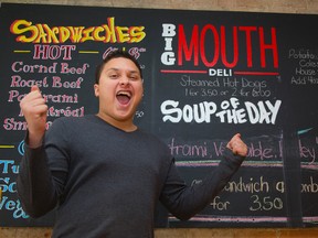 Jordan Perry and his dad Mike Perry have opened Big Mouth Deli on Clarence St. The restaurant gets its smoked meat from Montreal. (Mike Hensen/The London Free Press)