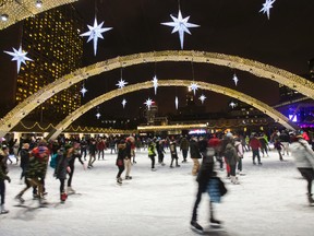 Ice skaters at Nathan Phillips Square in Toronto on Wednesday December 31, 2014. (Ernest Doroszuk/Toronto Sun)