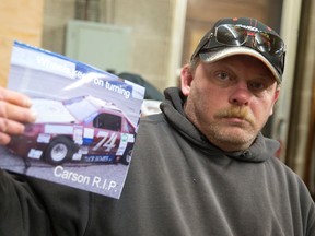 Rob Calhoun of London shows the CASCAR junior race car he helped Carson Ireland run at Delaware Speedway the past two seasons. (CRAIG GLOVER/The London Free Press)