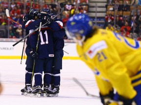 Slovakia celebrates winning the bronze medal over Sweden at 2015 World Junior Hockey Championships at the Air Canada Centre on January 5, 2015. (Dave Abel/Toronto Sun/QMI Agency)