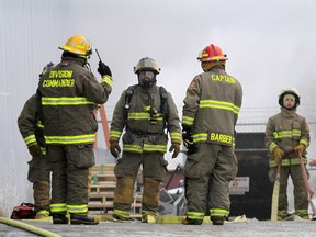 About 25 Quinte West, Ont. firefighters from Station 1 respond to a minor blaze that started at the back of a warehouse at GlobalMed Inc. at 155 Murray St. in Trenton, Ont. just before 8 a.m. Tuesday, Jan. 6, 2015.  - JEROME LESSARD/THE INTELLIGENCER/QMI AGENCY