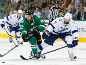 Tampa Bay Lightning defenceman Radko Gudas (right) tries to strip the puck from Colton Sceviour of the Dallas Stars during a preseason game at American Airlines Center on September 30, 2014 in Dallas. (Tom Pennington/Getty Images/AFP)