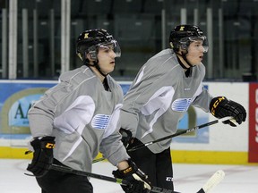 Kingston Frontenacs forwards Jared Steege, left, and Cody Caron during practice last season at the Rogers K-Rock Centre. (Ian MacAlpine/Whig-Standard file photo)