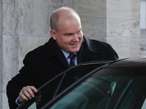 Royal Military College graduate Erin O'Toole leaves Rideau Hall in Ottawa on Monday after replacing Julian Fantino as veterans affairs minister. (Chris Wattie/Reuters)
