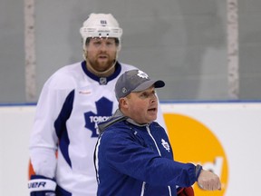 Interim coach Steve Spott gives directions during Maple Leafs practice on Tuesday at the MasterCard Centre. (Craig Robertson/Toronto Sun)