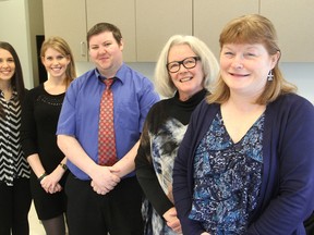 Involved in a long-term, sustainable lifestyle change study at Queen's University are, from left, dietitian Andrea Brennan, behavioural interventionist Stephanie Corras and participants Jonathan English, Sindi Crowe and Diane Reid. (Michael Lea/The Whig-Standard)
