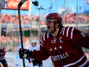 Alex Ovechkin of the Washington Capitals celebrates after scoring in the first period of the 2015 NHL Winter Classic against the Chicago Blackhawks at Nationals Park on January 1, 2015. (Rob Carr/Getty Images/AFP)
