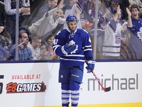 Toronto Maple Leafs forward Nazem Kadri and fans react after scoring an empty net goal against the Detroit Red Wings at the Air Canada Centre on Dec. 13, 2014. (John E. Sokolowski/USA TODAY Sports)