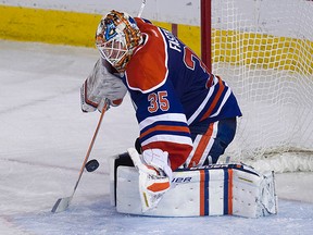 The Edmonton Oilers' goalie Viktor Fasth (35) makes a save against the Detroit Red Wings during third period NHL action at Rexall Place, in Edmonton Alta., on Tuesday Jan. 6, 2015. The Red Wings won 4-2. David Bloom/Edmonton Sun/QMI Agency