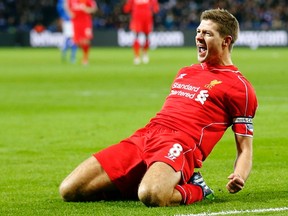 Liverpool's Steven Gerrard celebrates his goal during English Premier League play against Leicester City at the King Power Stadium in Leicester December 2, 2014. (REUTERS/Darren Staples)