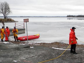 Members of Quinte Fire Department train on ice near the Duncan McDonald Memorial Community Gardens in Trenton, Ont. last week. - SUBMITTED PHOTO