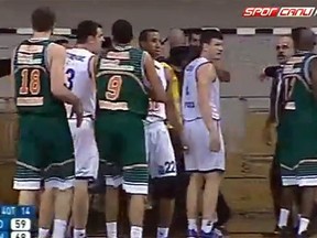 A court-invading fan sparked a brawl during a Eurocup basketball game in Montenegro. (Screen grab)