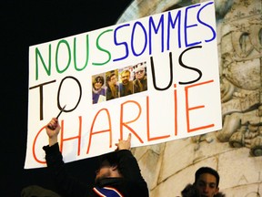 Thousands gather at the Place de la Republique in Paris, France to protest the terrorist attack on Charlie Hebdo on Wednesday Jan. 7, 2015. Vivian Song/QMI Agency