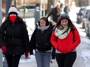 Queen's University students walk along campus during a cold snap in Kingston on Jan. 7. (Ian MacAlpine/The Whig-Standard)