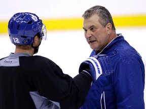 Maple Leafs coach Peter Horachek and defenceman Stephane Robidas on Jan. 7, 2015. (Craig Robertson, Toronto Sun)