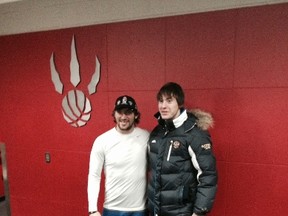 Caps star Alexander Ovechkin poses for a photo with a Russian junior team player. (Mike Zeisberger/Toronto Sun)