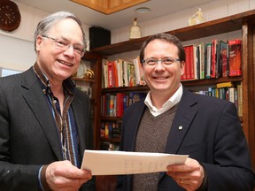 Gino Donato/The Sudbury Star
David Robinson (left), Sudbury Green party candidate for the Sudbury riding, and Mike Schreiner, leader of the Green Party of Ontario, look over some polling data in this file photo.