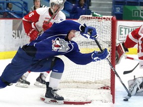 Gino Donato/The Sudbury Star/QMI Agency
Sudbury Wolves Danny Desrochers scores on the wrap around on Soo Greyhounds goalie Brandon Halverson during second period OHL action from the Sudbury Community Arena on Wednesday night.