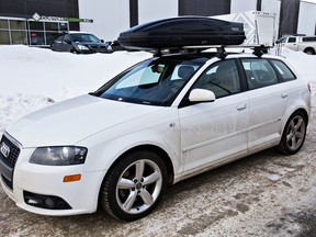 A white Audi stolen with a one-year-old baby inside is seen near 154 Street and 122 Avenue in Edmonton, Alta., on Wednesday, Jan. 7, 2015. (Codie McLachlan/Edmonton Sun/QMI Agency)