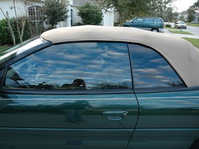 A tinted car window. (Wikipedia -- User:Steevven1; Originally hosted on http://www.steevven1.com/pictures.php)