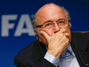 FIFA President Sepp Blatter attends a news conference after a meeting of the FIFA executive committee in Zurich in this September 26, 2014 file photo. (REUTERS)