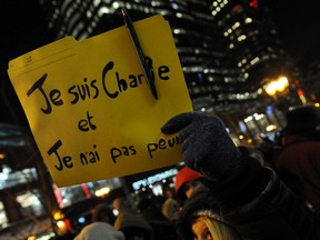 Thousands of people gathered in front of the Consulate General of France in Montreal on McGill College Avenue, in downtown Montreal, following the terrorist attack in Paris in the satirical magazine Charlie Hebdo with 12 dead , Wednesday, January 7, 2015 .
MAXIME DELAND / QMI AGENCY