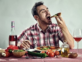 Man eating. 

(Fotolia)