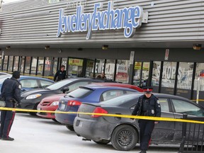 Toronto Police at the scene of a robbery/shooting at the Jewellery Exchange on Eglinton Ave. E. in Scarborough Thursday, Jan. 8, 2015. (Dave Thomas/Toronto Sun)