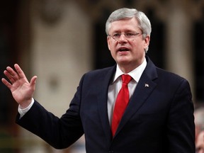 Canada's Prime Minister Stephen Harper speaks during Question Period in the House of Commons on Parliament Hill in Ottawa December 3, 2014. REUTERS/Chris Wattie