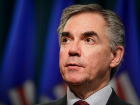 Alberta Premier Jim Prentice speaks with media at the McDougall Centre in downtown Calgary, Alta., on Friday, Dec. 19, 2014. Prior to the press conference, Prentice had met with Gary Doer, Canada's ambassador to the U.S. Lyle Aspinall/Calgary Sun