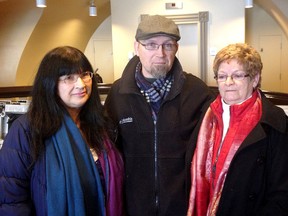 Debra Gill, left, Glen Smith and Sharon McIvor outside traffic court in Memorial Hall at City Hall after John Butler was convicted in the death of Marlene Smith, Glen's mother, on Wednesday. (Ian MacAlpine/The Whig-Standard)