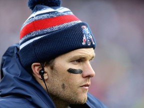 The Patriots, led by quarterback Tom Brady, are the top seed in the AFC for a reason and they'll remind us why against the Ravens. (GETTY IMAGES)