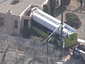 An Albuquerque city bus crashed through the front of a house in Albuquerque, New Mexico, Jan. 8, 2014. (KQRE News 13 screengrab)